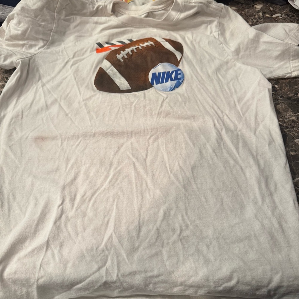 Nike kids XL teeshirt.  One call out spot